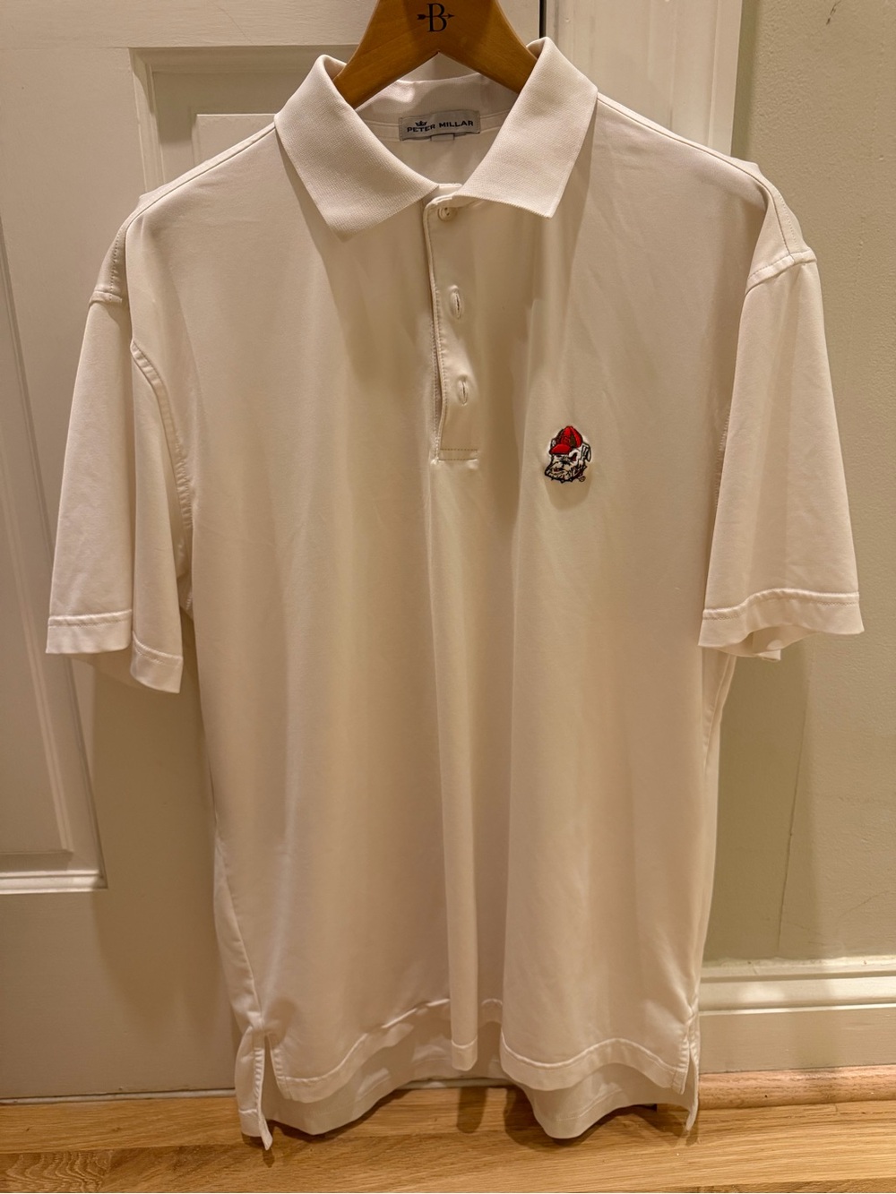 Peter Millar Cream Polo with Small Red & Black Embroidered Motif